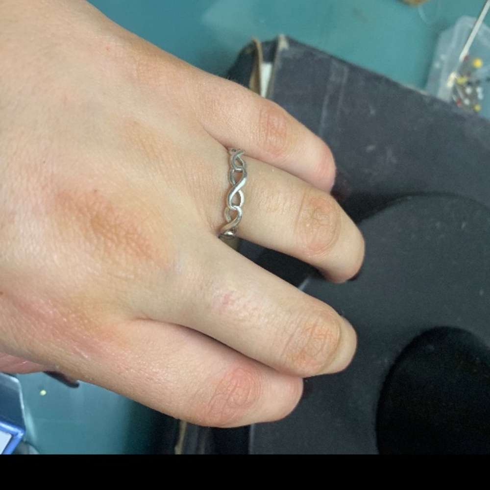 Tiffany & Co infinity ring thin band